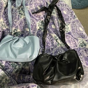 Blue and black hand bags I have 1 of each
